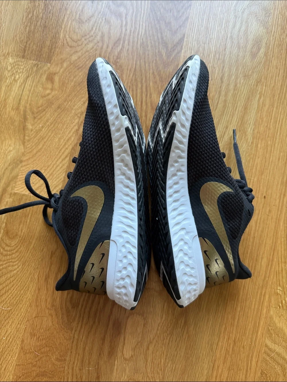 Nike Revolution Black and Gold Lightweight Running Sneakers NWOT
